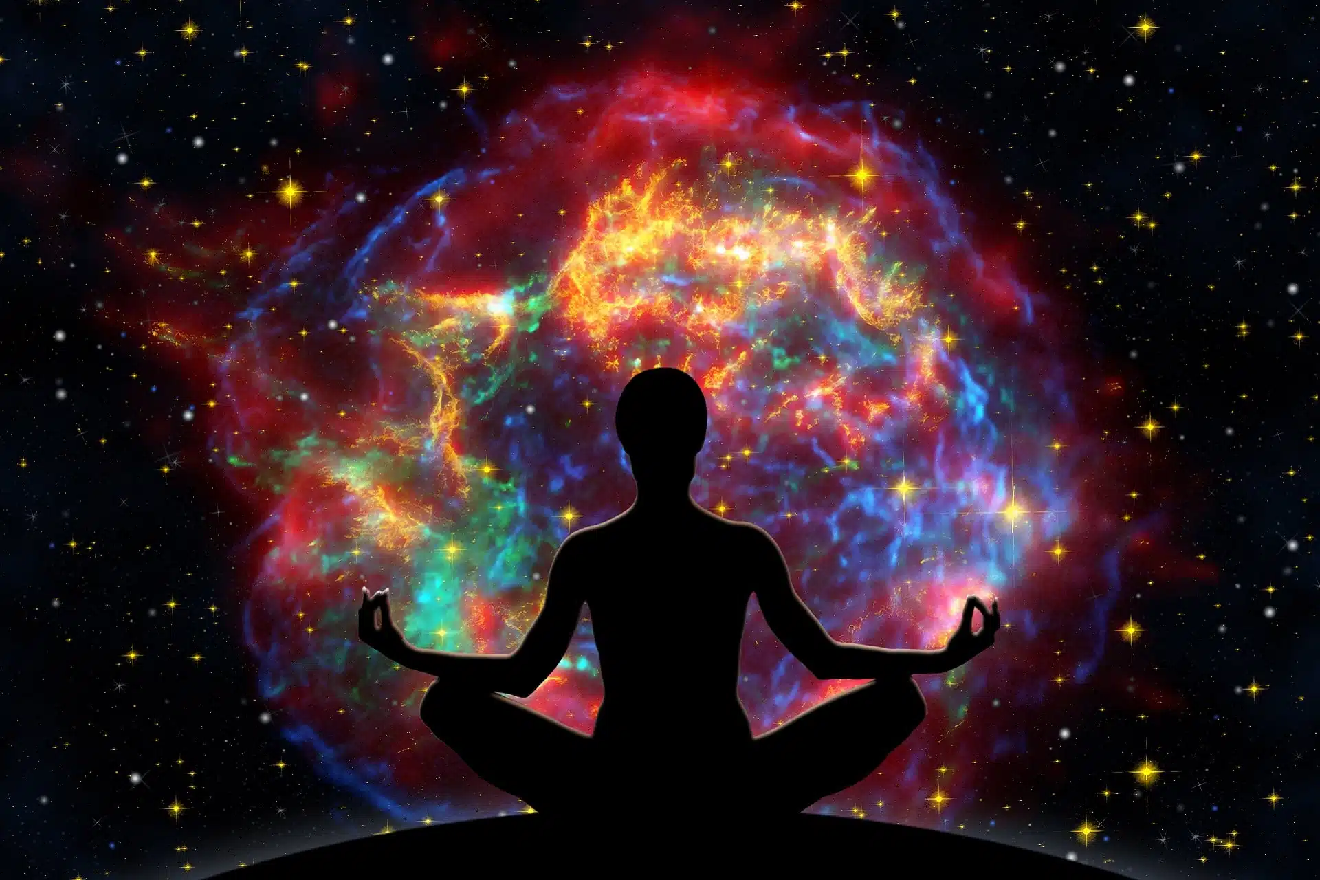 Female yoga figure against universe background with Supernova explosion.