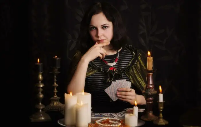 A psychic reader with divination cards